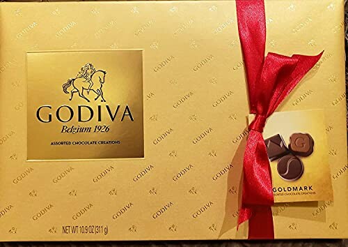 Godiva assorted chocolate box with red ribbon